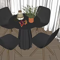 Round Dining Table Set with Four Black Chairs Wooden Legs and Decorative Vase Plants