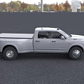 Silver Heavy Duty Pickup Truck With Double Cab Chrome Grille And Alloy Wheels