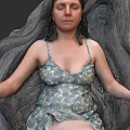 Woman In Green Floral Dress Sitting On Root Like Chair With Closed Eyes