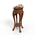 Carved Wooden Side Table With Intricate Details And Cake With Fruits On Top