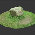 Round Green Grass Circle With Large Rock And Bare Soil Patch