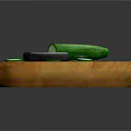 Wooden Cutting Board With Whole Cucumber Knife And Sliced Cucumber