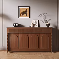 Modern Wooden Sideboard with Decorative Items on Top Against Gray Wall and Wooden Floor