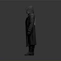 Man In Black Hooded Long Coat Standing Against Simple Gray Background