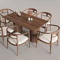 Modern Wooden Dining Table Set With Six White Cushioned Chairs And Decorative Items