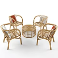 Rattan Outdoor Table With Matching Chairs And Decorative Cushions For Patio Use
