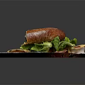 Crusty Bread Ham And Cheese Sandwich With Fresh Lettuce On White Plate
