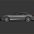 Sleek Silver Sports Car With Aerodynamic Design And Alloy Wheels