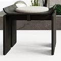 Modern Black And Wooden Stools With Green Plant Near Stone Wall Background