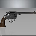 Classic Silver Revolver With Brown Wooden Grip And Shiny Metal Barrel