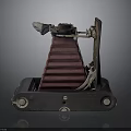 Vintage Electronic Device Classic Folding Camera With Red Bellows And Black Base