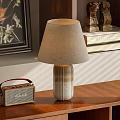 Stylish Table Lamp With Beige Shade On Wooden Table Near Vintage Radio And Books