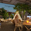 Modern Industrial Restaurant Interior With Green Plants Stone Stepping Stones And Bar Counter