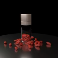 Goji Berries in Glass Bottle with Scattered Berries on Black Surface