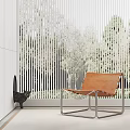 Brown Leather Accent Chair With Metal Frame By Window With Vertical Blinds And Trees Outside