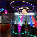 Modern Stylish Bar Interior With Neon Lights Circular Decor Moon Chandelier And Colorful Seating
