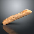 Golden Artisan Baguette Bread With Textured Crust Isolated On Dark Background