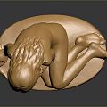 Decorative Furniture Piece Featuring Golden Reclining Human Figure Sculpture With Shiny Base