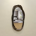 Wall Mounted Wooden Frame Mirror With Irregular Shape Reflecting Sofa And Wooden Floor