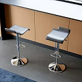 Modern Adjustable Bar Stools With Metal Base In Kitchen With Wooden Cabinets