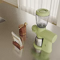 Modern Kitchen Counter With Green Coffee Maker Brass Container And Wooden Knife Holder