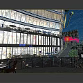 Modern Sky Mall Night Scenery With Glass Facade Bright Lights Slide And Plaza Near High Rise Buildings