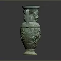 Green Ceramic Sculpted Vase With Two Handles And Intricate Carved Patterns