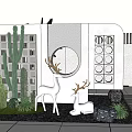 Outdoor Garden Feature Wall With Cacti Deer Sculptures Circular Mirror And Lighting