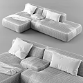 Modern Gray Sectional Sofa With Black Pillows And Draped Soft Blanket 3d model