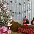 Cozy Christmas Photo Spot With Decorated Tree Merry Banner Gifts And Guitar