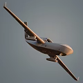 Gray Passenger Plane Flying in Clear Sky with Extended Wings and Engines