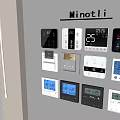 Various Black And White Switch Panels With Digital Temperature Displays On Grey Wall