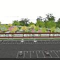 Landscaped Garden Wall With Greenery And Parking Area For Cars