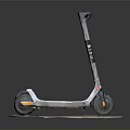 Silver Electric Scooter With Black Handlebar HEX Logo And Wheels On Stone Slab Surface