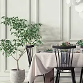 Elegant Dining Table Set With Black Chairs Tablecloth And Flower Centerpieces