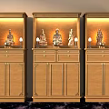 Three Decorative Wooden Buddhist Shrine Cabinets With Illuminated Buddha Statues And Carved Details