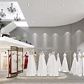 Elegant Bridal Shop Interior With White Wedding Dresses Red Evening Gowns And Chandeliers