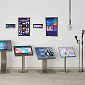 Commercial Equipment Featuring Interactive Displays Wall-Mounted Screens Floor-Standing Kiosks And Microphones