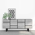 Modern Wooden Entryway Cabinet Sideboard With Gray Finish Black Legs Green Plant And Decorative Painting