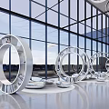 Modern Lounge Area With Large Glass Windows Circular Ring Seats Smooth Floor And Pendant Lights
