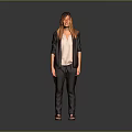 Woman with red hair in black blazer white shirt dark pants sandals against gray background