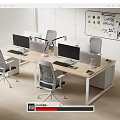 Modern Office Desk in Open Office Space with Multiple Computer Monitors Office Chairs and Whiteboard