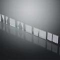 Modern White Decorative Panels With Grid And Slat Patterns Arranged Neatly On Dark Surface