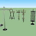 Various Stylish Metal Clothes Hangers With Decorative Designs And Floor Stand Bases