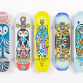 Colorful Skateboard Decks With Unique Artistic Designs And Brand Logos