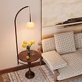 Stylish Floor Lamp By Sofa With Checkered Cushions Side Table And Yellow Flowers