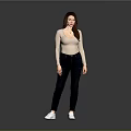 Woman in beige long sleeve top and dark jeans with white sneakers against gray background