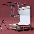 Mobile Digital Product Photography Studio Setup With White Backdrop Hanging Lights And Tripod Camera