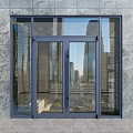 Modern Glass Double Doors With Metal Frame And City Reflection On Stone Wall