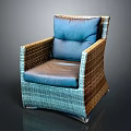 Modern Woven Rattan Chair Featuring Blue Cushion And Brown Comfortable Seat